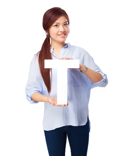 Happy chinese woman with t letter — Stock Photo, Image