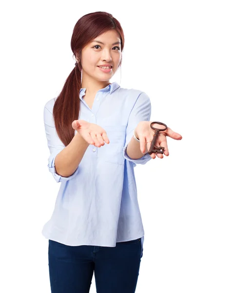 Happy chinese woman with vintage-key — Stock Photo, Image