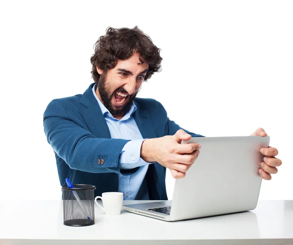 Angry businessman with laptop — Stock Photo, Image