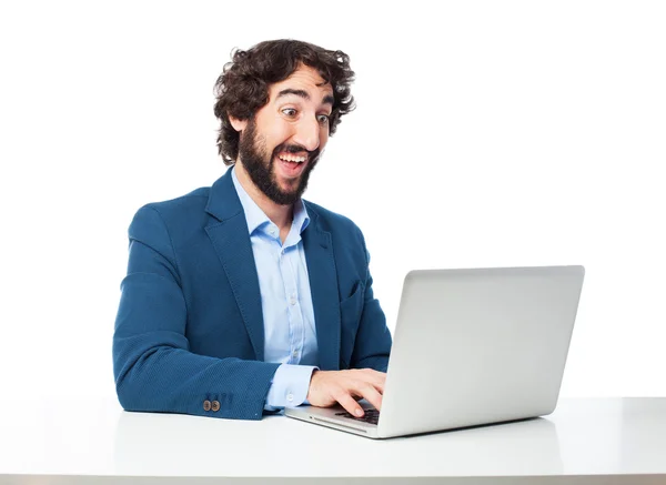 Glad affärsman med laptop — Stockfoto