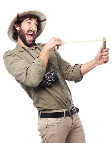 Crazy explorer man with slingshot — Stock Photo, Image