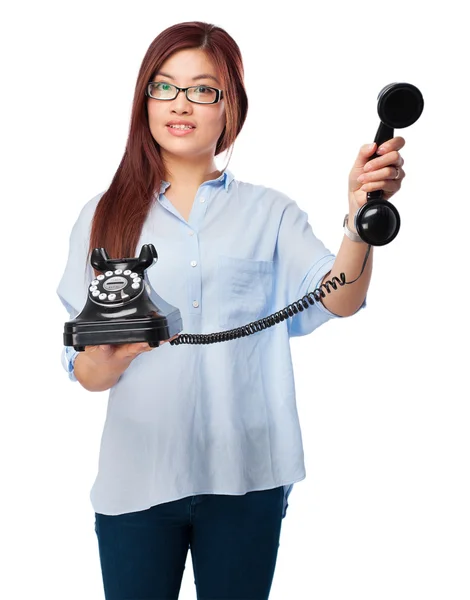 Happy chinese woman with telephone — Stock Photo, Image