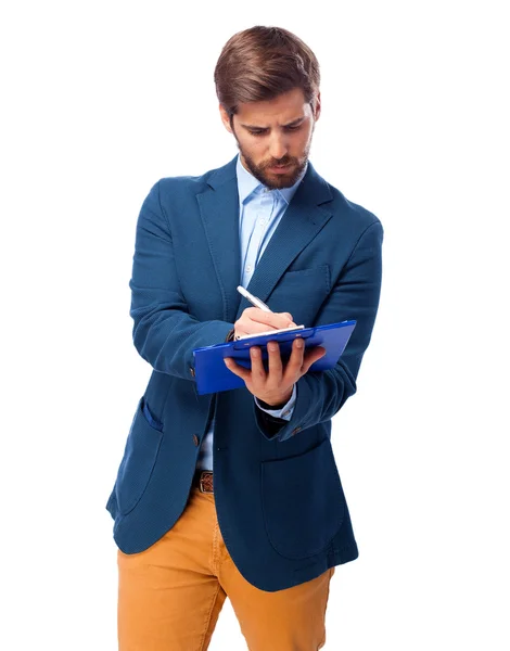 Zufriedener Geschäftsmann mit Notizbuch — Stockfoto