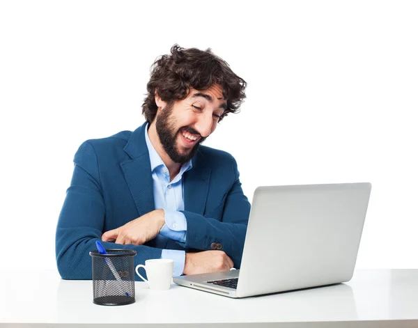 Lachender Geschäftsmann mit Laptop — Stockfoto