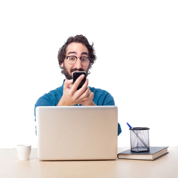 Empresário com laptop e telefone — Fotografia de Stock