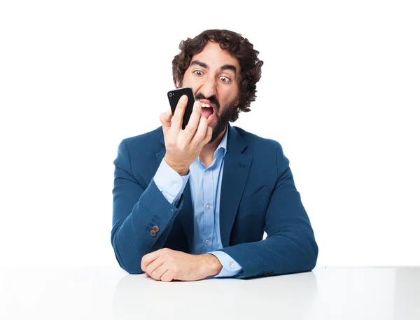 Angry businessman with telephone — Stock Photo, Image