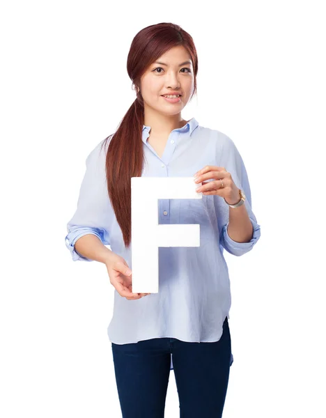 F harfi ile mutlu Çinli kadın — Stok fotoğraf