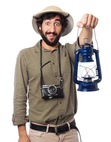 Crazy explorer man with oil lamp — Stock Photo, Image