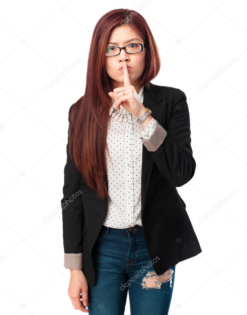 happy chinese woman silence gesture