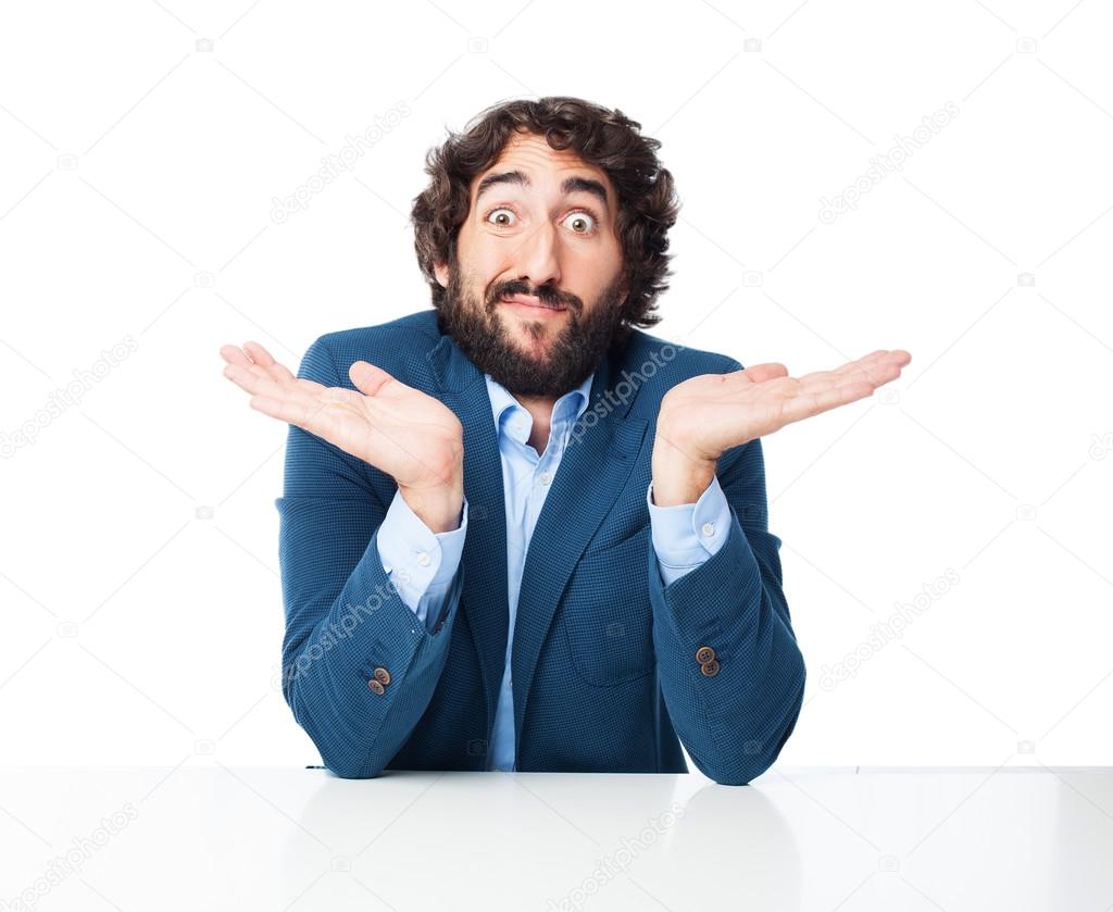 confused businessman with sit table