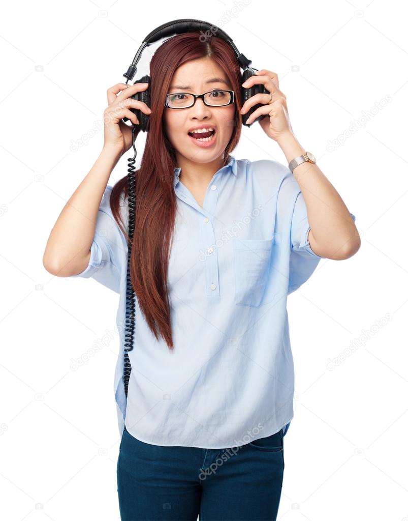 shouting chinese woman with headphones