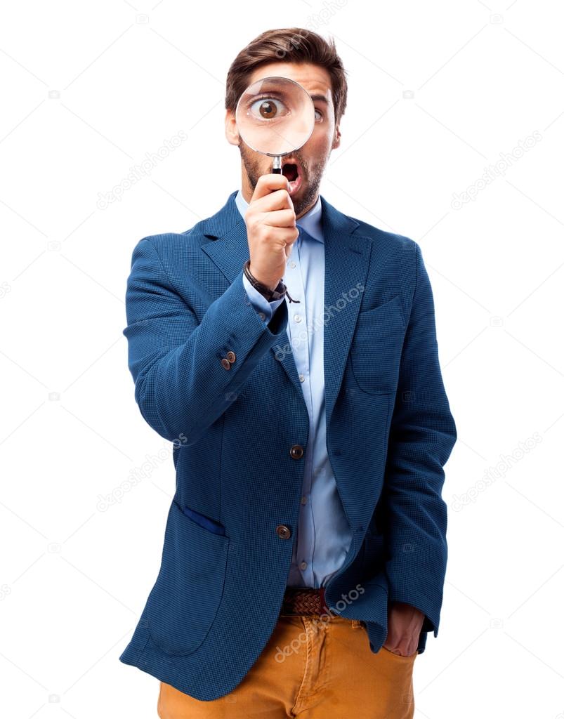  businessman looking for with magnifying glass