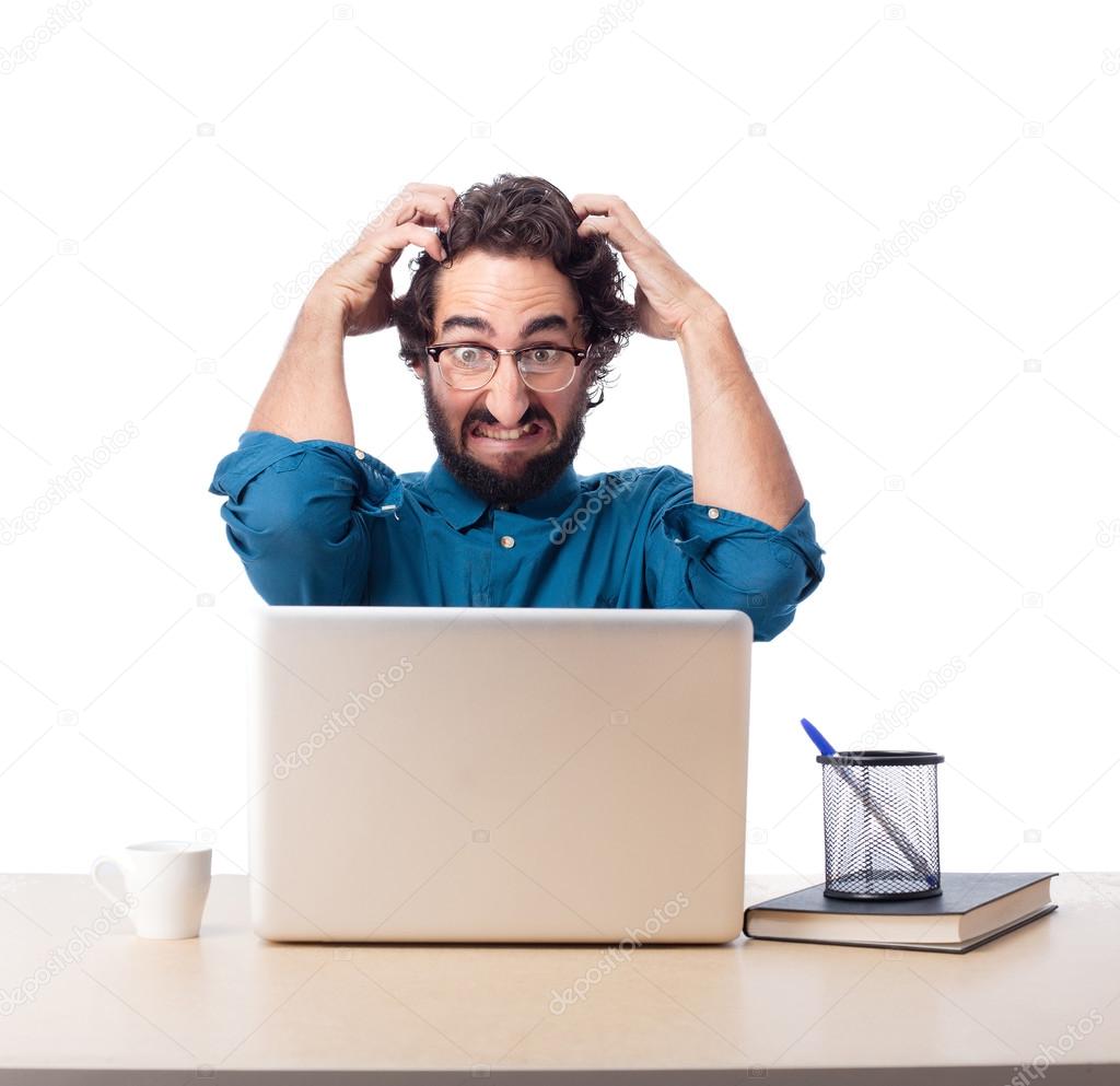 angry businessman with laptop