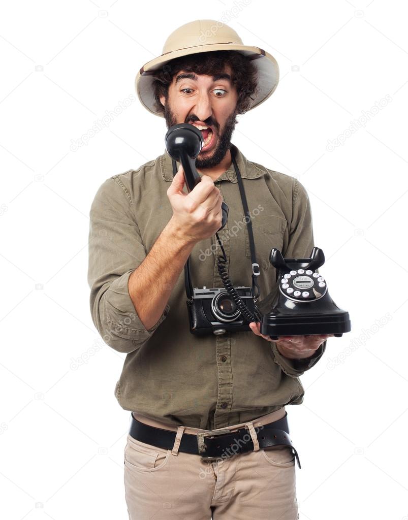 crazy explorer man with telephone