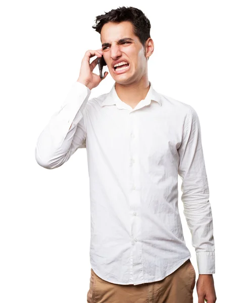 Happy young man with mobile phone — Stock Photo, Image