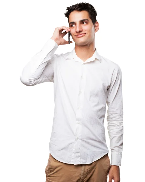 Šťastný mladý muž s mobilním telefonem — Stock fotografie