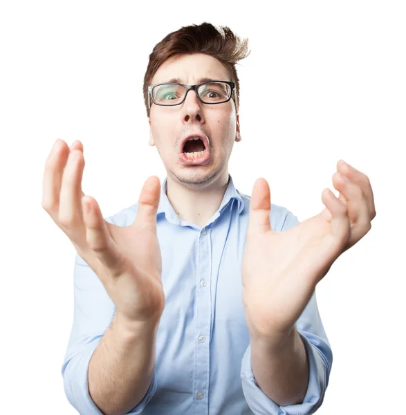 Scared young man in worried pose — Stock Photo, Image