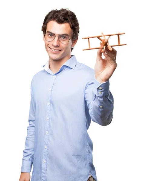 Happy young man with plane — Stock Photo, Image