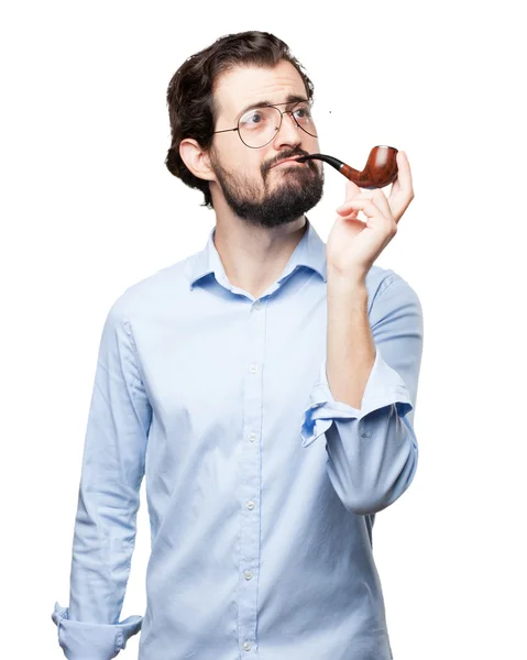 Proud young man with pipe — Stock Photo, Image