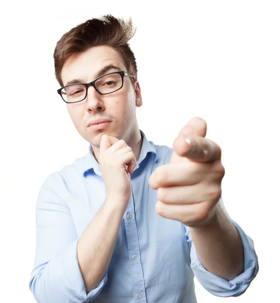 Proud young man pointing front — Stock Photo, Image