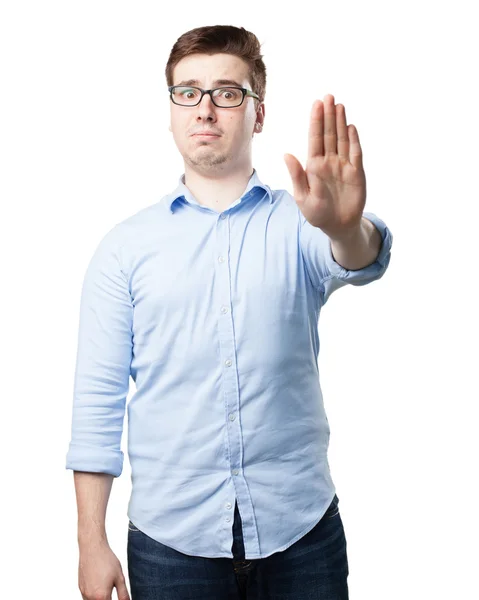 Angry young man with stop gesture — Stock Photo, Image