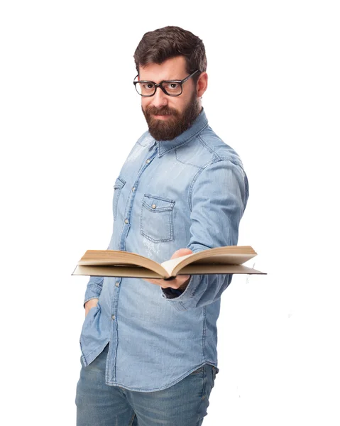 Felice giovane uomo con piccolo libro — Foto Stock