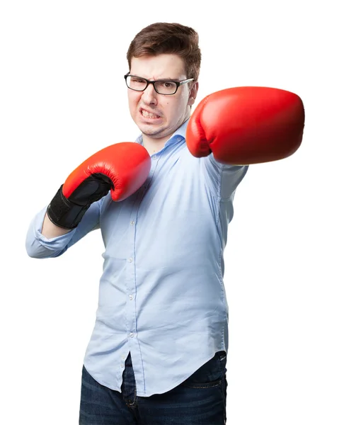 Angry young man boxing — Stock Photo, Image