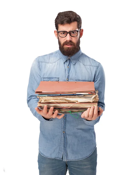 Jovem estressado com arquivos — Fotografia de Stock