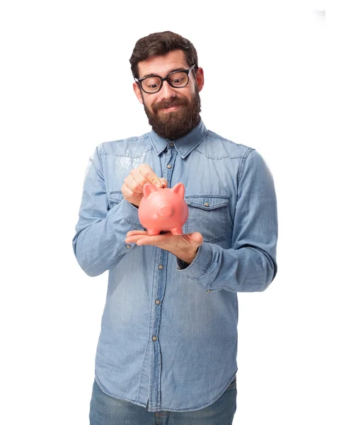 Jovem feliz com banco porquinho — Fotografia de Stock