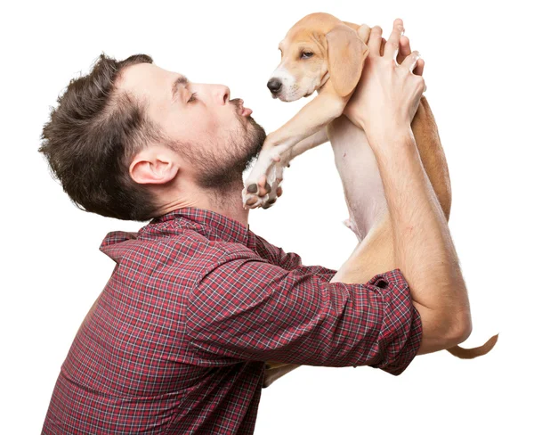 Gelukkig jonge man met puppy — Stockfoto