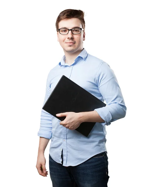 Happy young man with small book — Stock Photo, Image