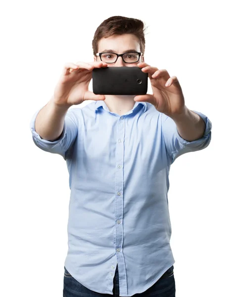 Man doing selfie on mobile phone — Stock Photo, Image