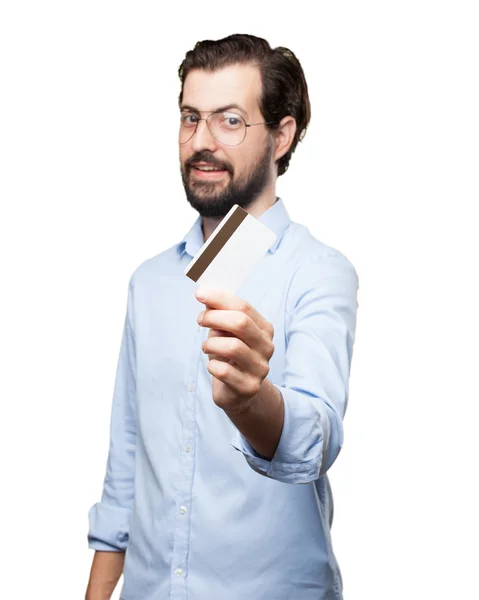 Happy young man with credit card — Stock Photo, Image