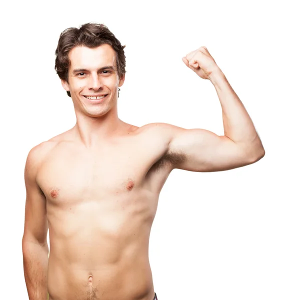 Strong young man in proud pose — Stock Photo, Image