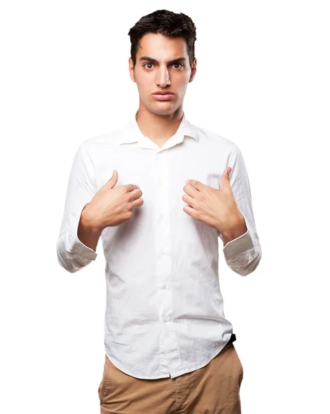 Förvirrad ung man i orolig pose — Stockfoto