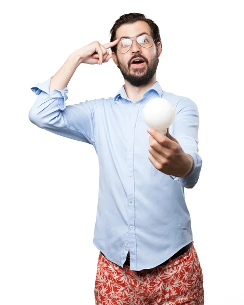 Gelukkig jonge man met idee teken — Stockfoto