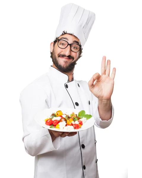 Cocinero hombre bien signo con ensalada —  Fotos de Stock