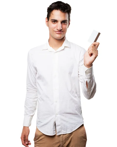 Happy young man with credit card — Stock Photo, Image