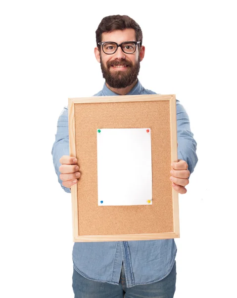 Jovem feliz com corkboard — Fotografia de Stock