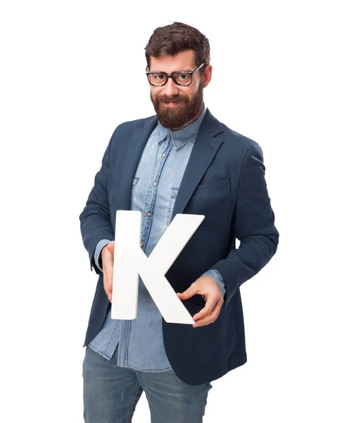 Ευτυχής επιχειρηματίας εκμετάλλευση γράμμα K — Φωτογραφία Αρχείου