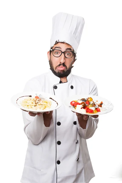 Cocinero dudando con pasta —  Fotos de Stock