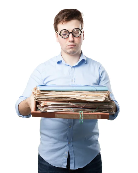 Crazy young man with files — Stock Photo, Image