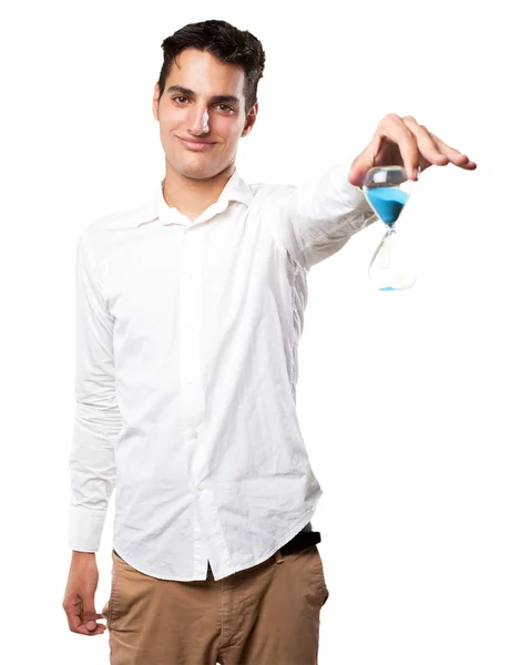 Jeune homme heureux avec minuterie de sable — Photo