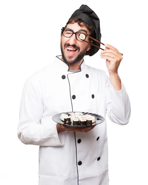 Gelukkig cook man met sushi — Stockfoto