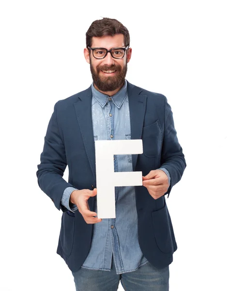 Щасливий бізнесмен тримає лист F — стокове фото