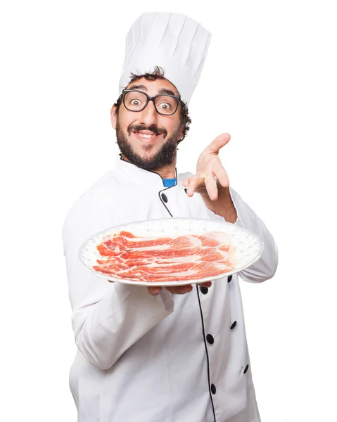 Šťastný cook muž s jamon — Stock fotografie