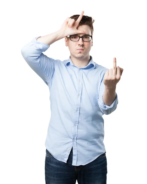 Angry young man met verliezer teken — Stockfoto