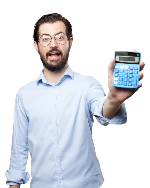 Счастливый молодой человек с калькулятором — стоковое фото
