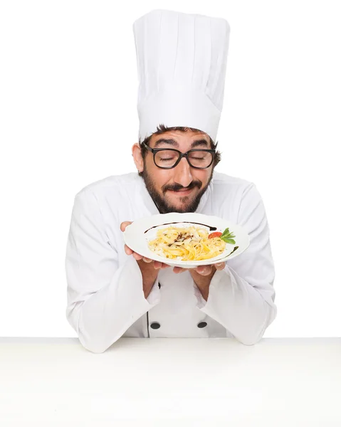 Orgulhoso cozinheiro com macarrão — Fotografia de Stock