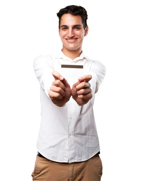 Joven feliz con tarjeta de crédito —  Fotos de Stock